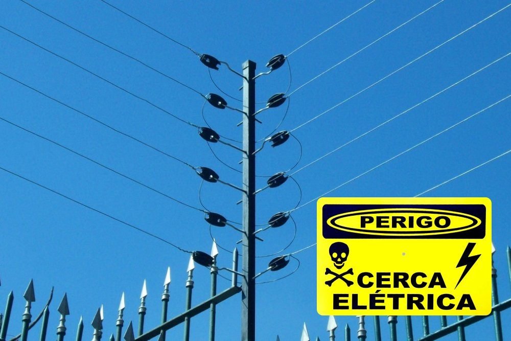Cerca elétrica instalada sobre grade de proteção